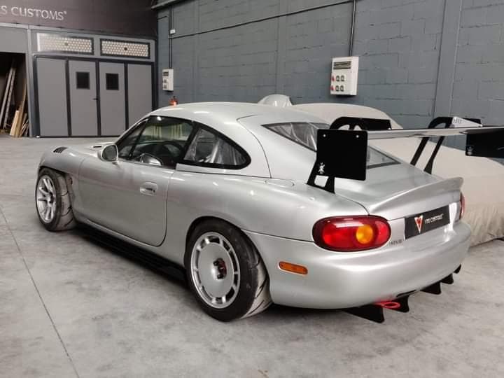 NB Miata fastback hardtop — workshop detail shot