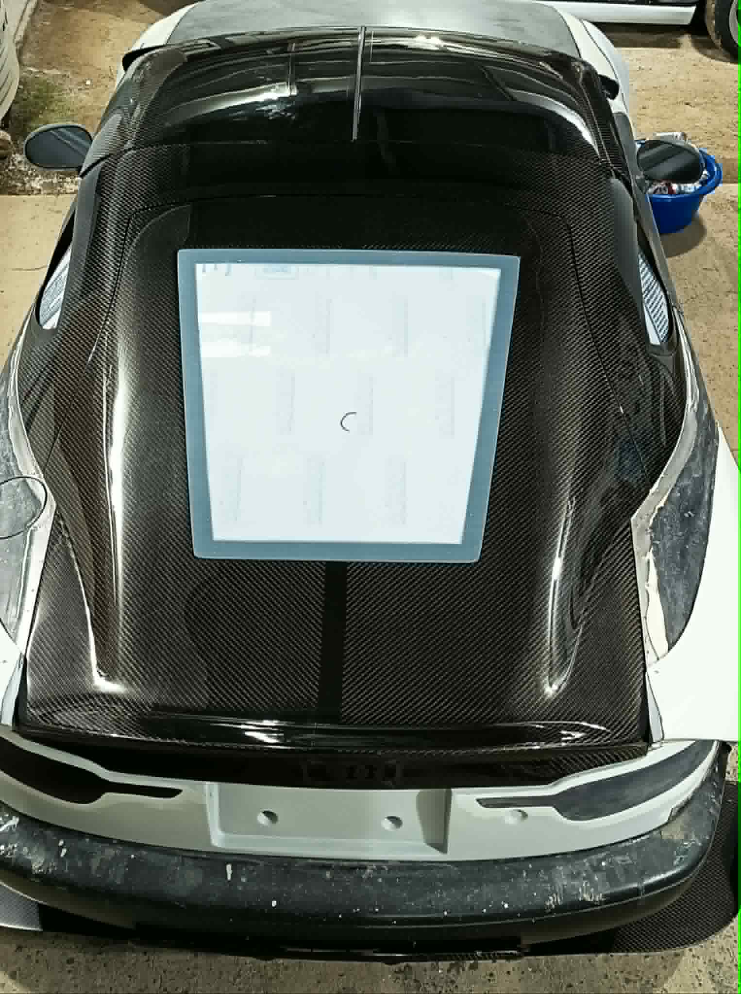 Fastback roofline from rear — showing sweep from roof to tail