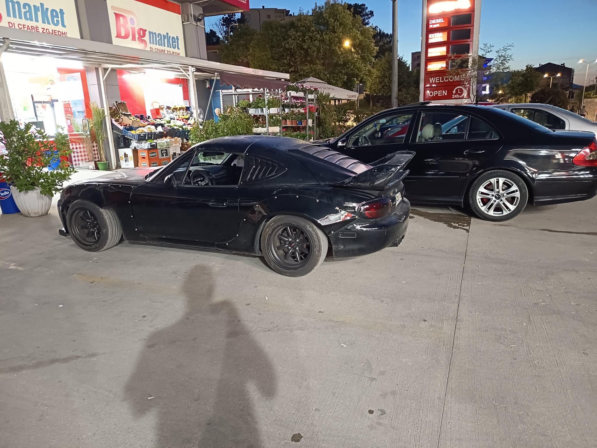 NB Miata fastback hardtop — side view highlighting the sloping coupe silhouette