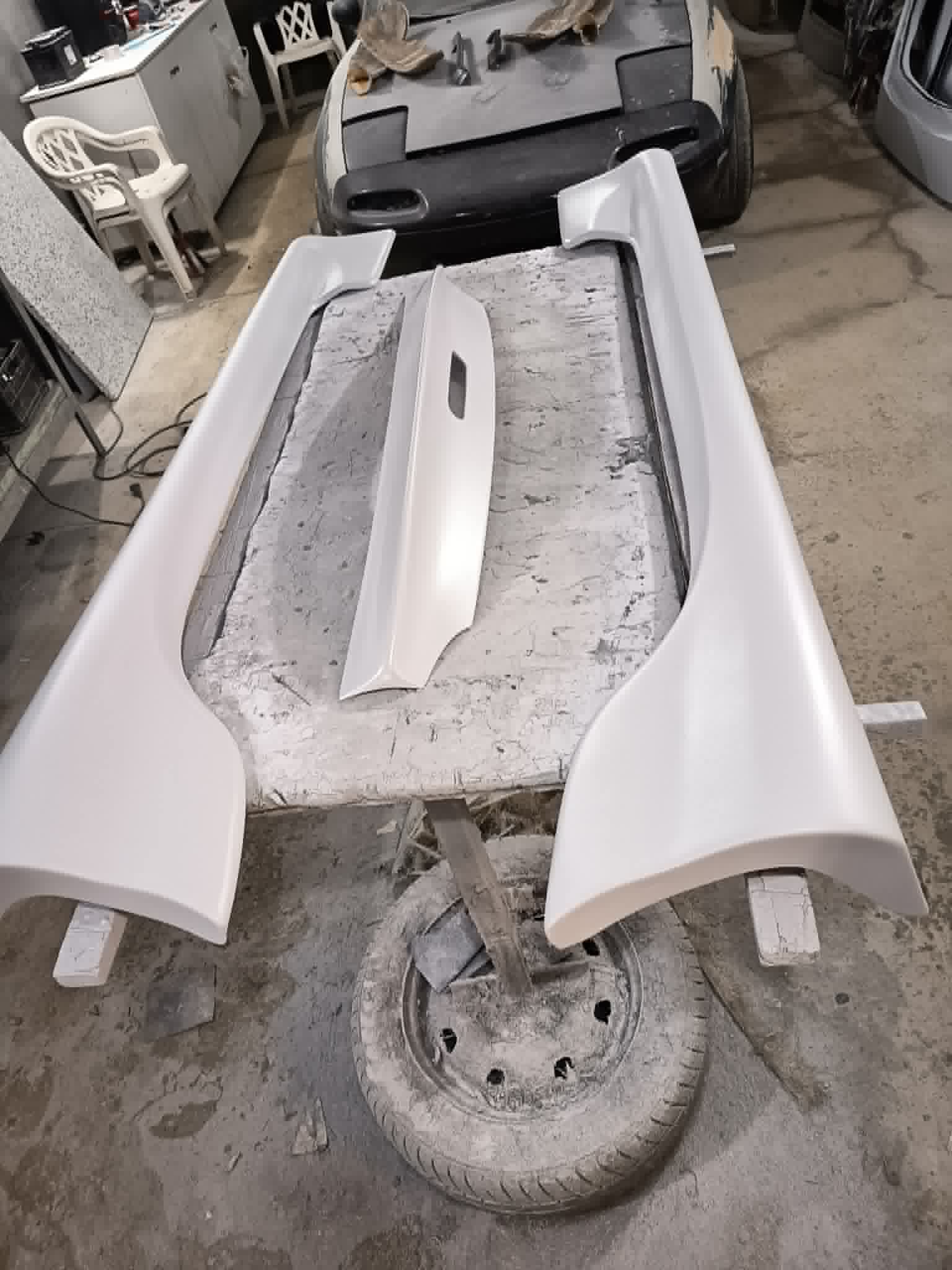 Completed NB Miata fastback build — finished and ready for paint